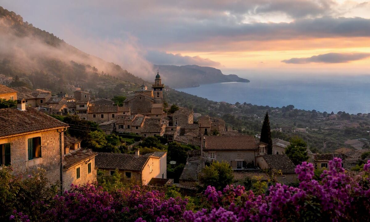 Aerial view of Deià village and sea coast