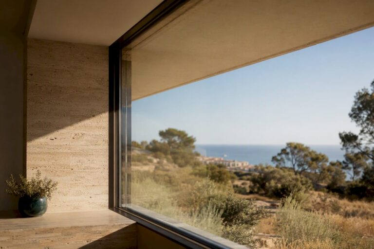 Shaded Mallorca home window in summer