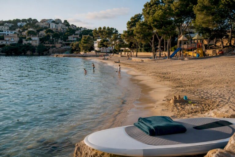 Santa Ponsa beach with paddleboard and play area